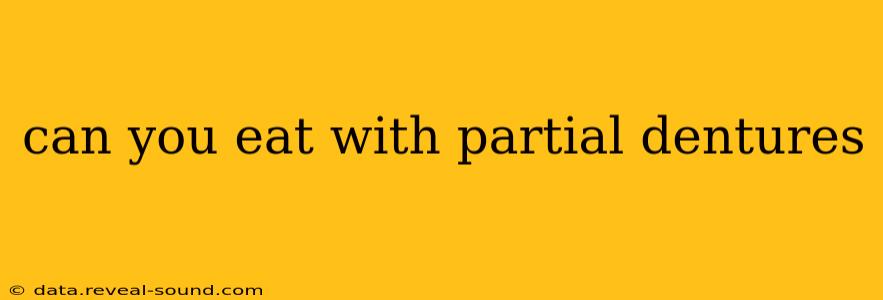 can you eat with partial dentures