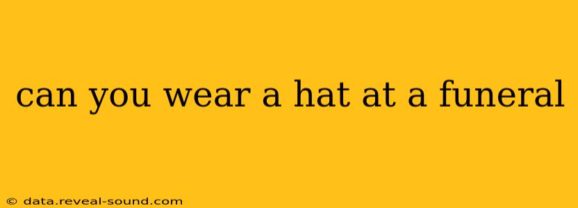 can you wear a hat at a funeral
