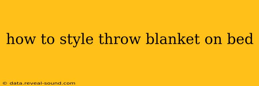 how to style throw blanket on bed