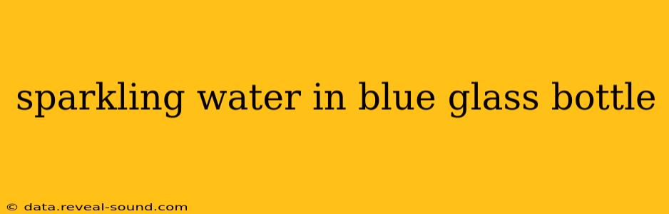 sparkling water in blue glass bottle