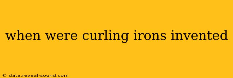when were curling irons invented