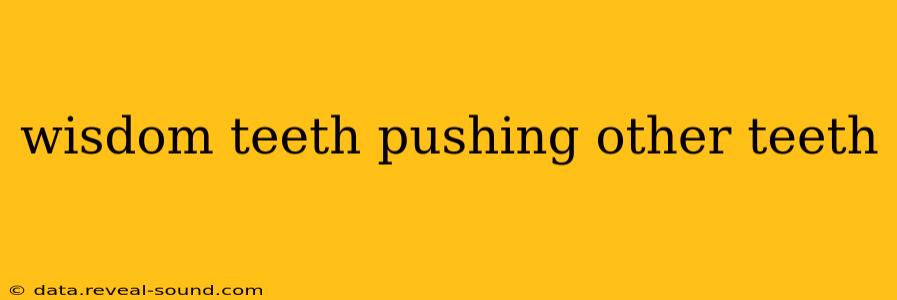 wisdom teeth pushing other teeth
